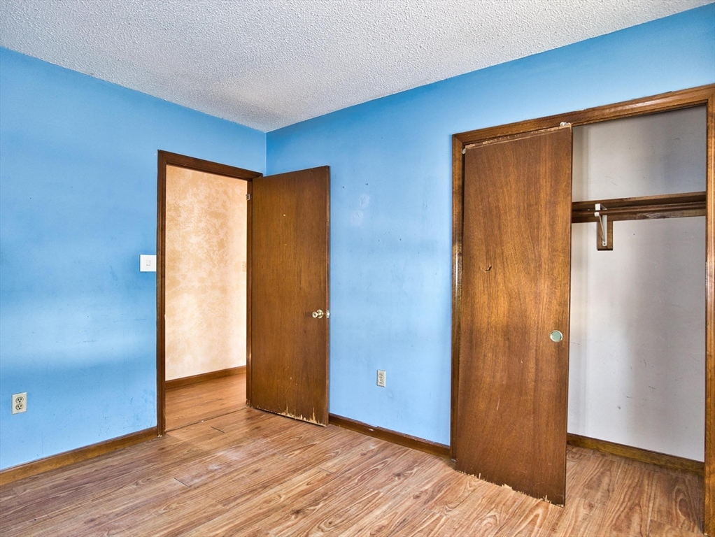 170 Nelson Street Fall River, MA 02721 - Photo 27 of 42 a view of an empty room with wooden floor and a window
