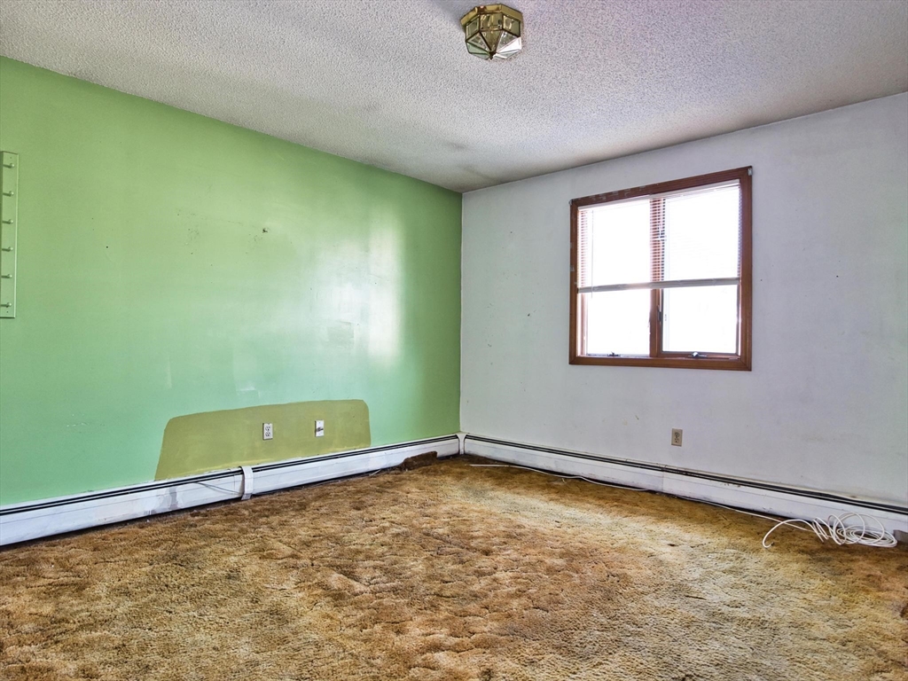 170 Nelson Street Fall River, MA 02721 - Photo 28 of 42 an empty room with window