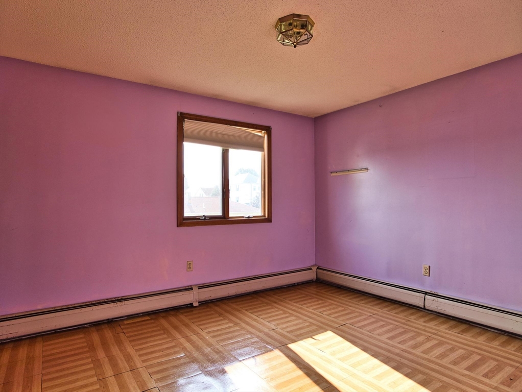 170 Nelson Street Fall River, MA 02721 - Photo 30 of 42 a view of an empty room with a window