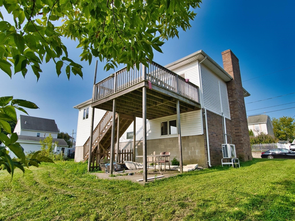 170 Nelson Street Fall River, MA 02721 - Photo 8 of 42 a view of a house with a yard