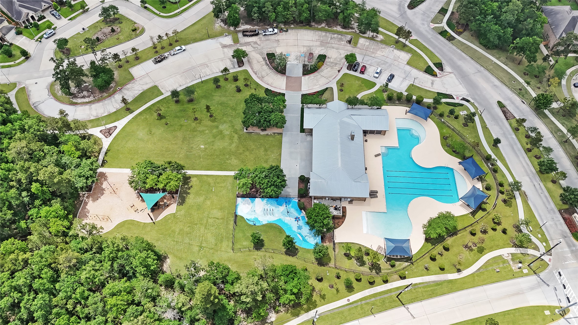 28169 Knight Peak Drive Spring, TX 77386 - Photo 29 of 33 an aerial view of a house with swimming pool and garden