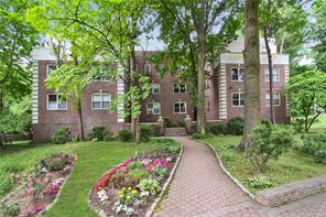 15 Sunnybrook Road, Unit A2 Bronxville, NY 10708 - Photo 1 of 1 a view of a garden with pathway
