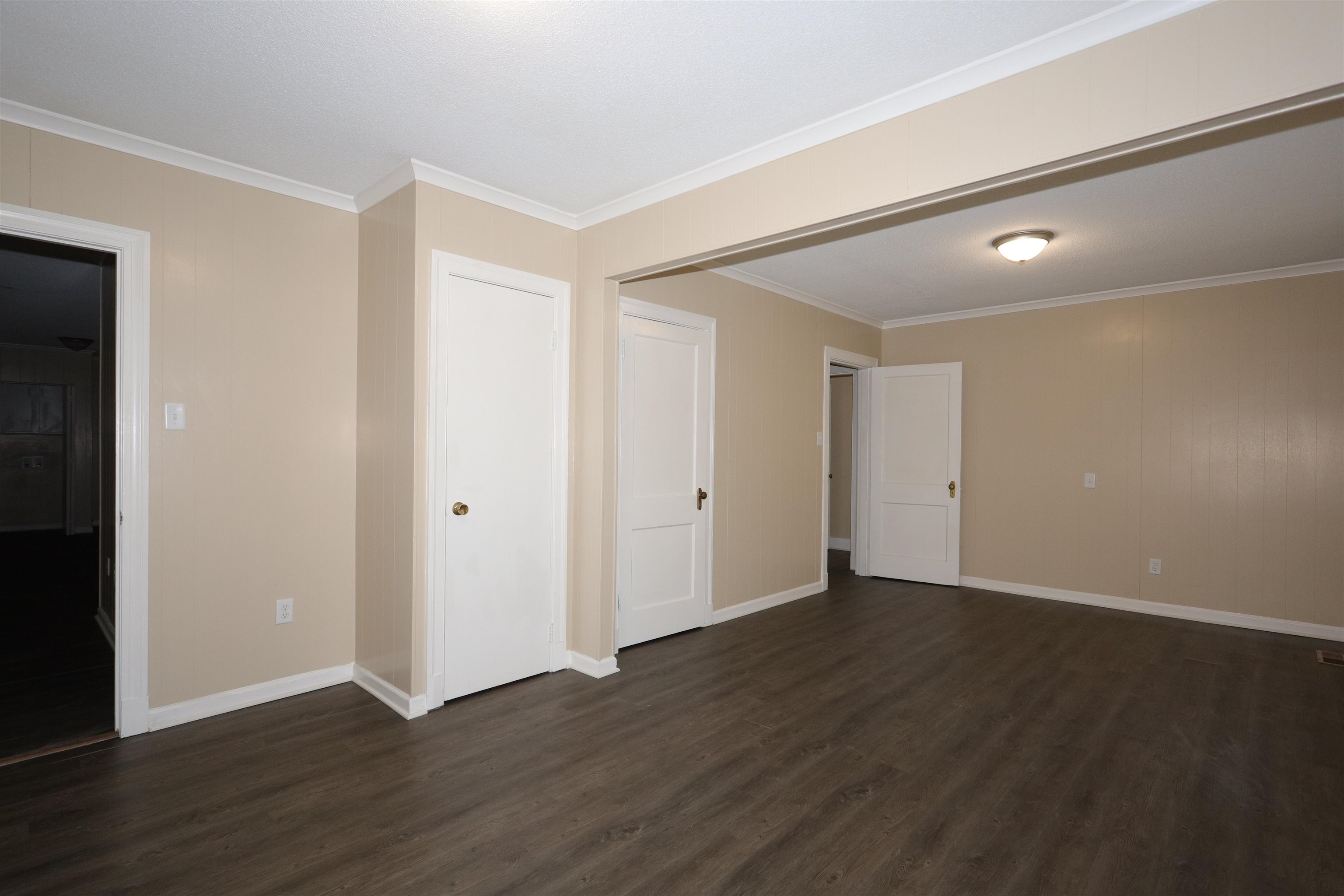 1042 Mosby Road Memphis, TN 38116 - Photo 12 of 21 a view of an empty room with wooden floor
