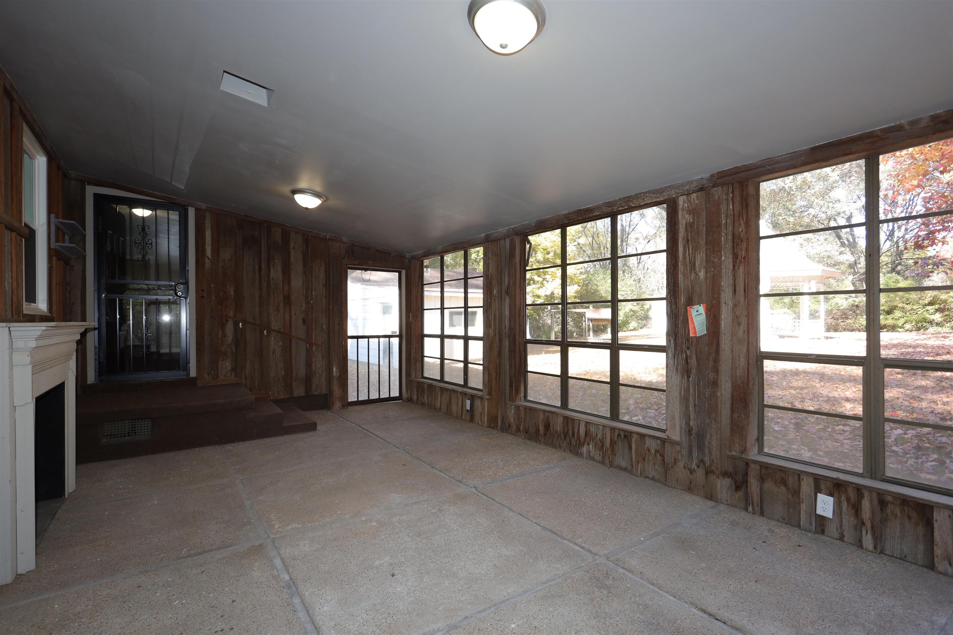 1042 Mosby Road Memphis, TN 38116 - Photo 15 of 21 a view of an empty room with a balcony