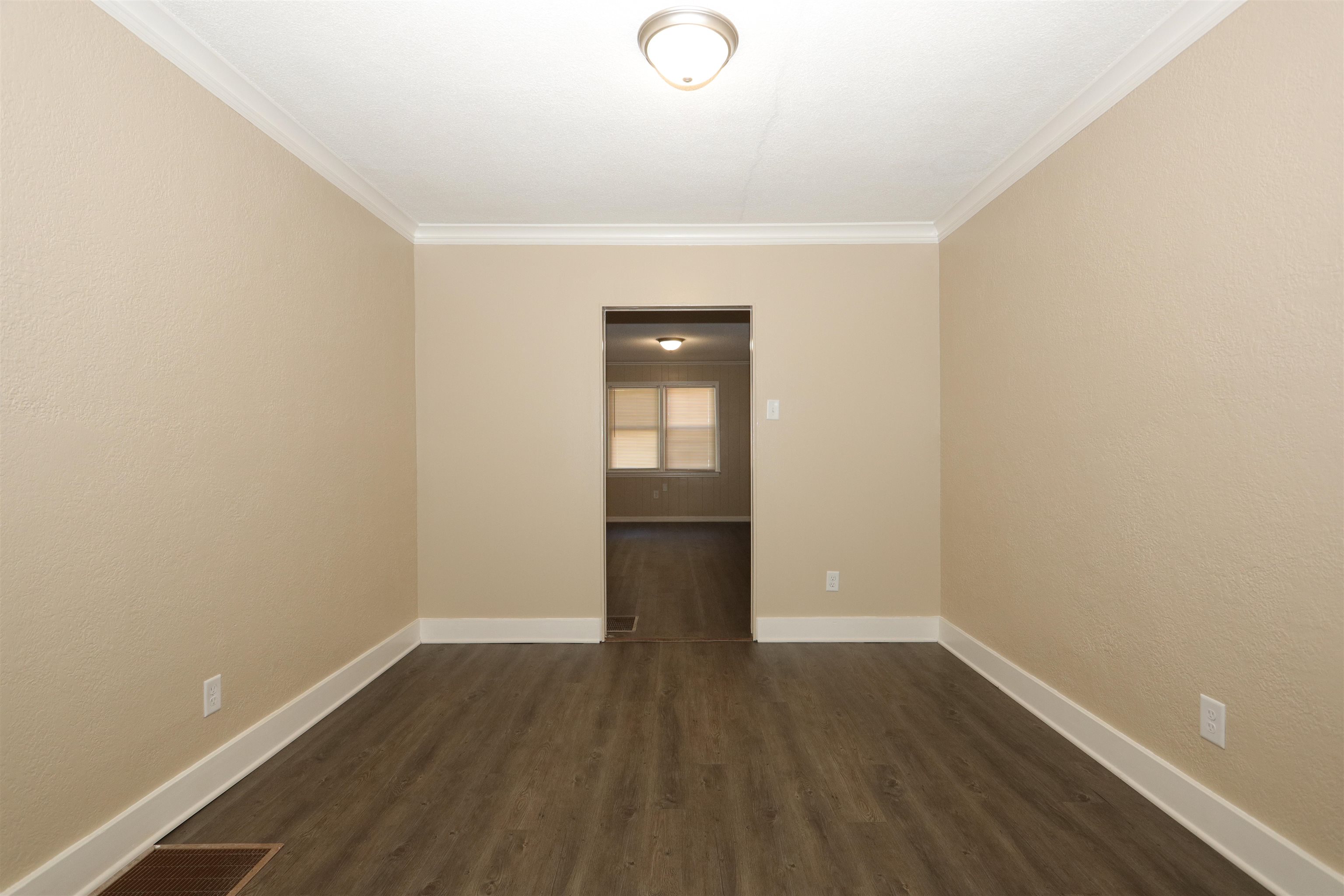 1042 Mosby Road Memphis, TN 38116 - Photo 18 of 21 a view of wooden floor and windows in a room