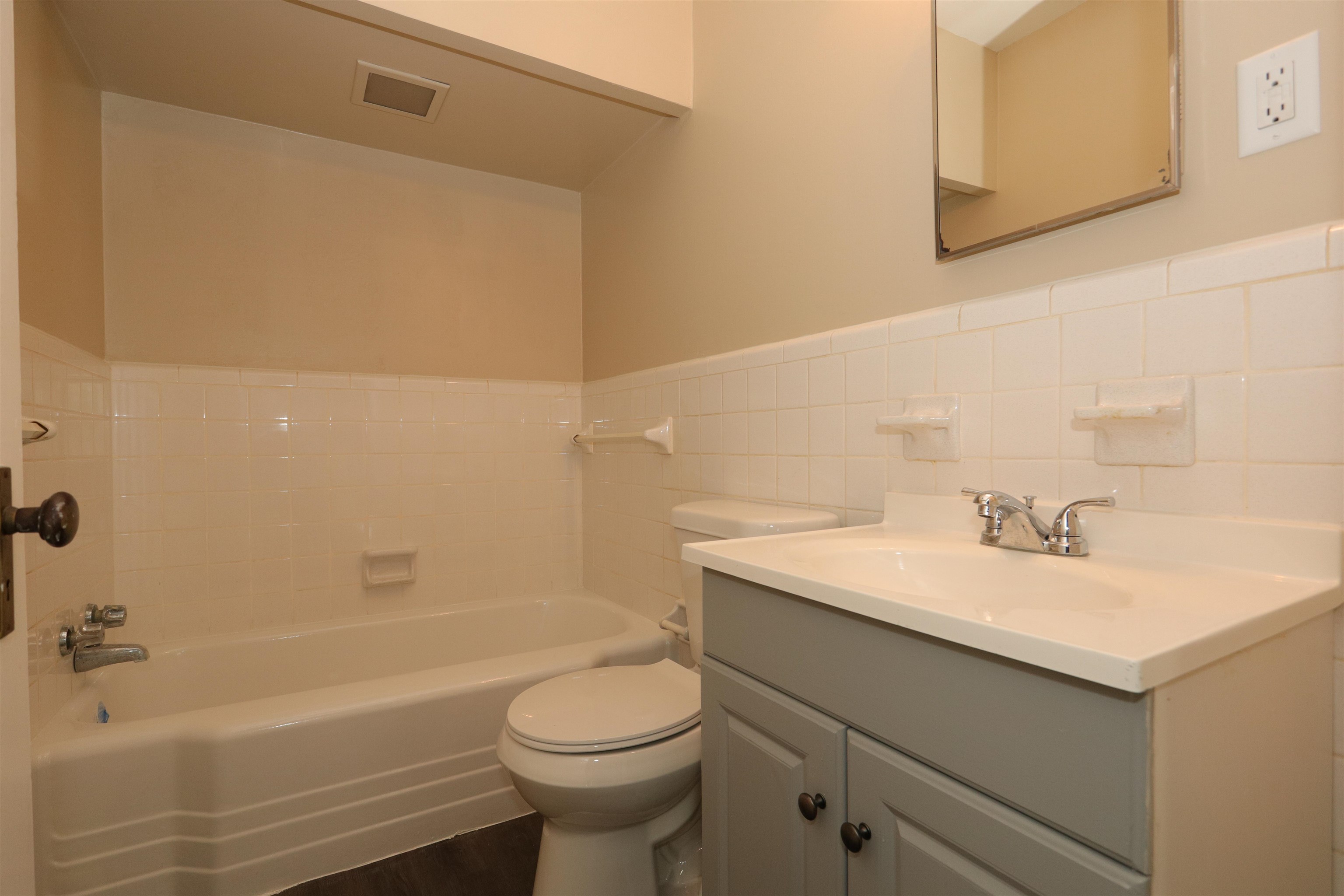 1042 Mosby Road Memphis, TN 38116 - Photo 21 of 21 a bathroom with a sink a toilet and bathtub