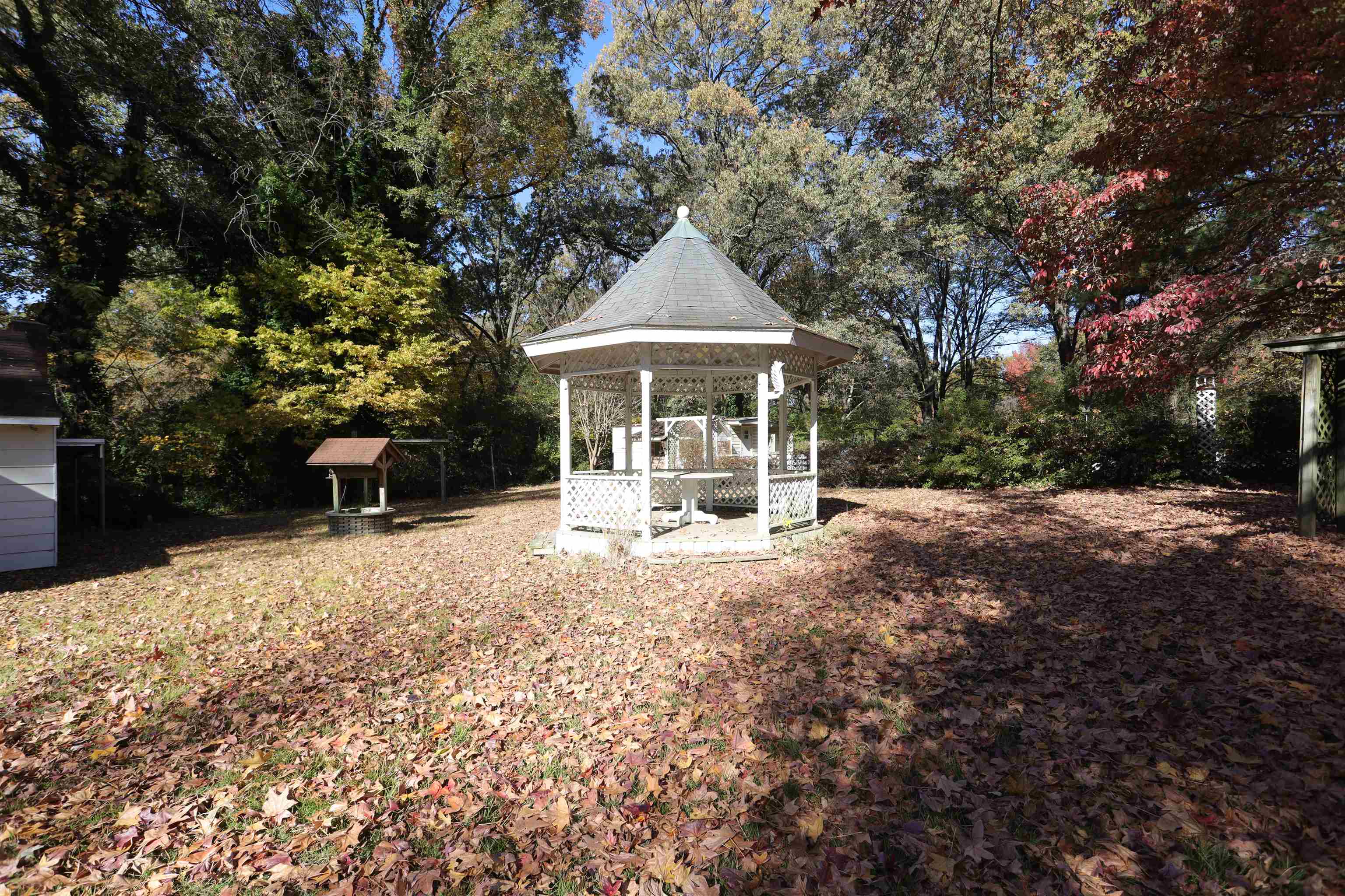 1042 Mosby Road Memphis, TN 38116 - Photo 5 of 21 a view of a house with backyard and sitting area