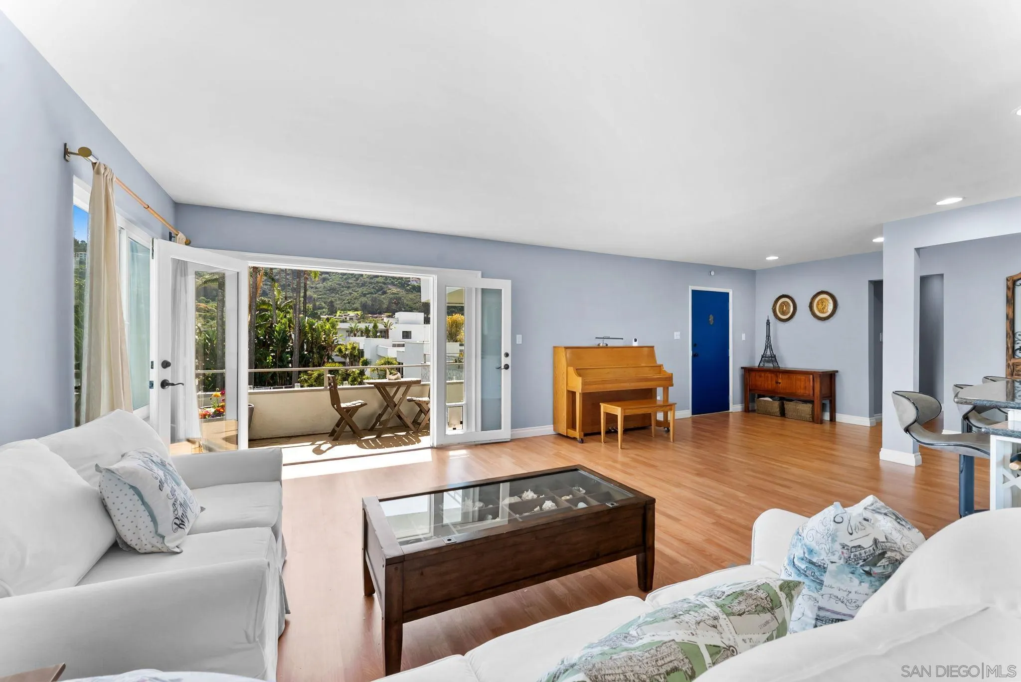 2360 Torrey Pines Road, Unit 28 La Jolla, CA 92037 - Photo 1 of 35 a living room with furniture and a large window