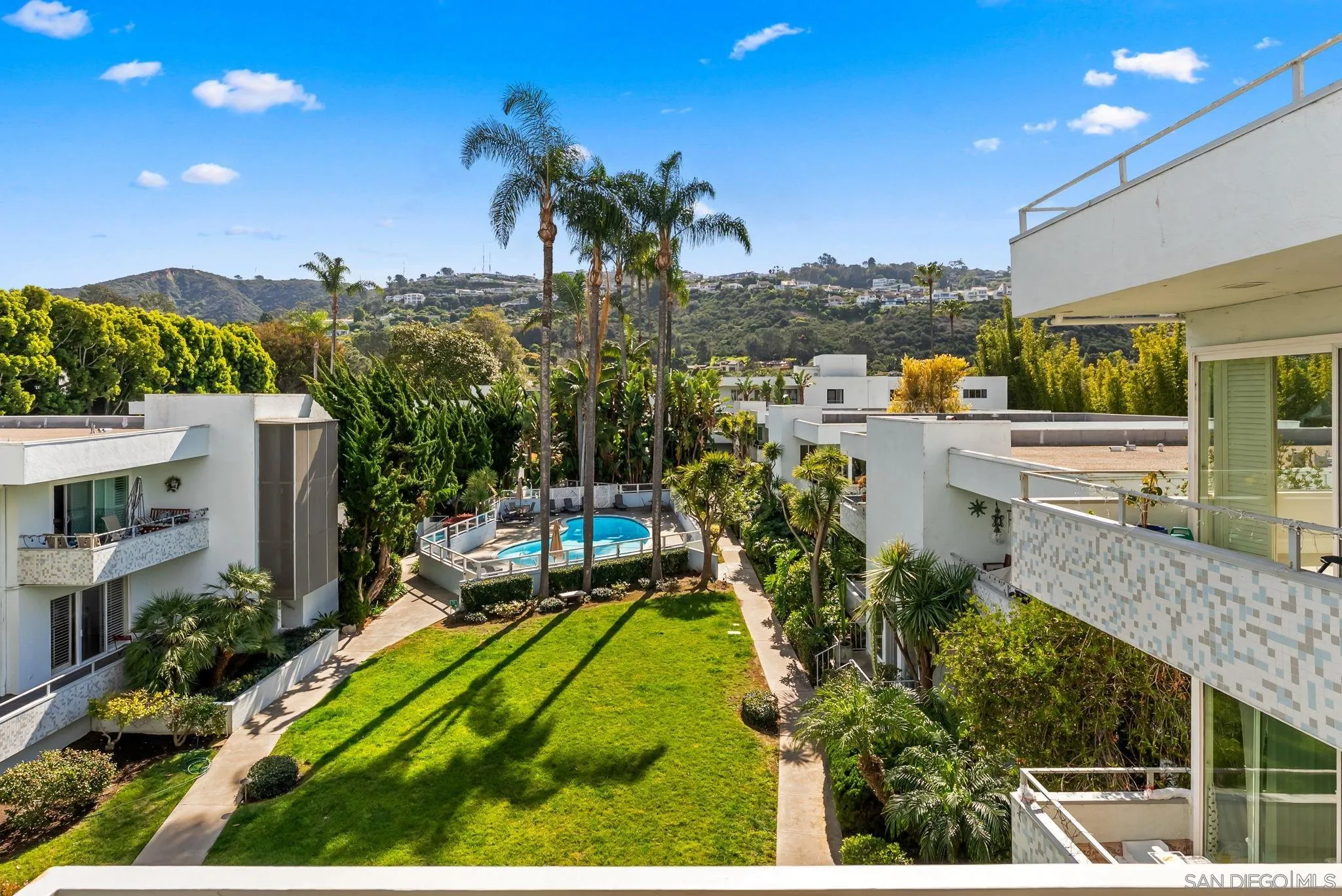 2360 Torrey Pines Road, Unit 28 La Jolla, CA 92037 - Photo 14 of 35 a view of a swimming pool and outdoor seating