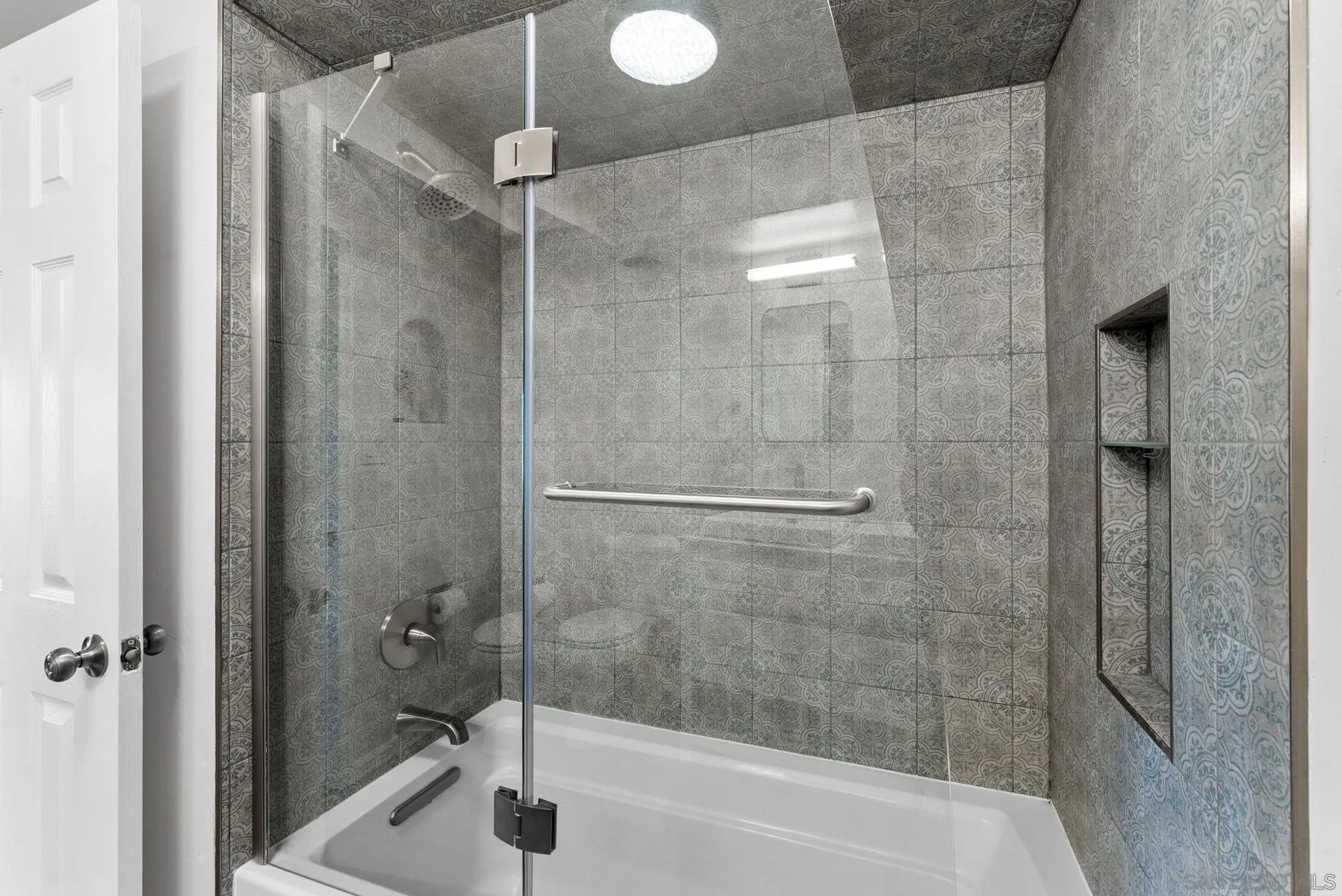 2360 Torrey Pines Road, Unit 28 La Jolla, CA 92037 - Photo 24 of 35 a bathroom with a shower and a sink