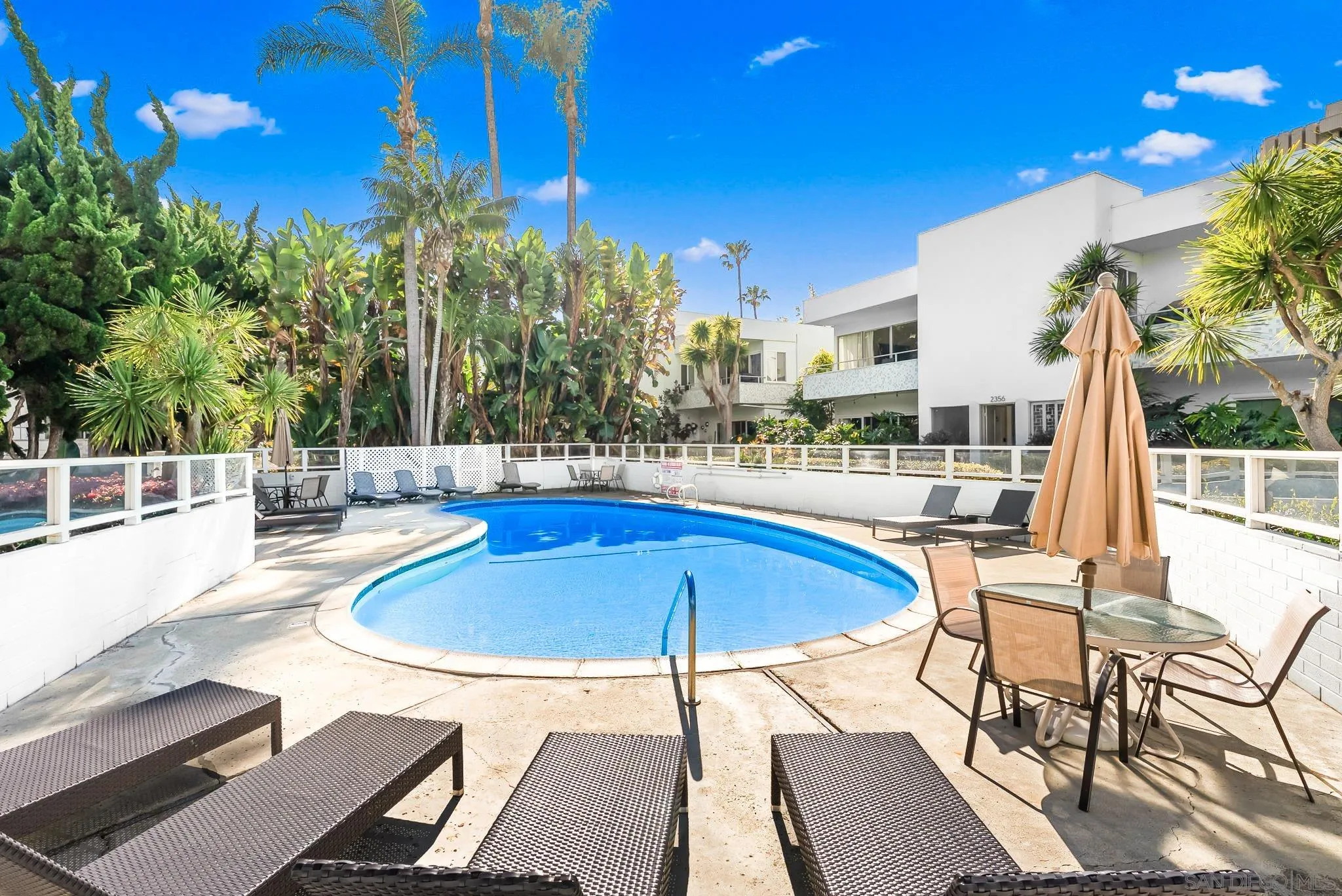 2360 Torrey Pines Road, Unit 28 La Jolla, CA 92037 - Photo 30 of 35 a view of a swimming pool with a patio