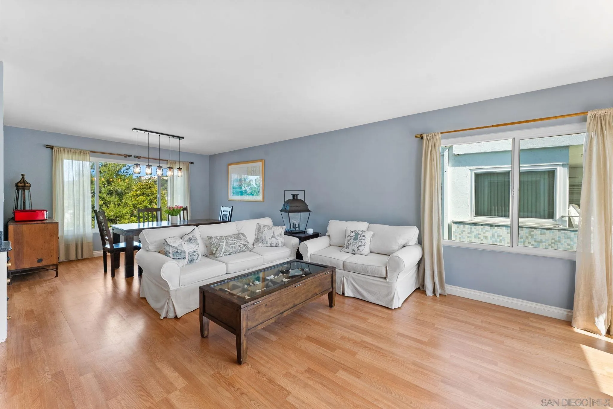 2360 Torrey Pines Road, Unit 28 La Jolla, CA 92037 - Photo 6 of 35 a living room with furniture and a large window