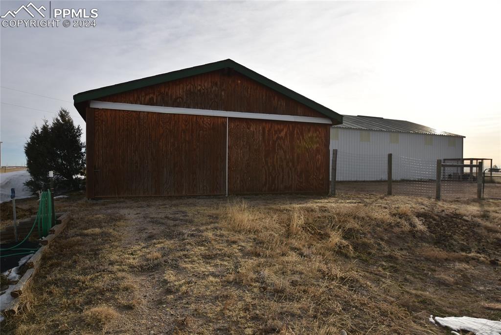 9990 Hahn Road Calhan, CO 80808 - Photo 13 of 25 a backyard of a house