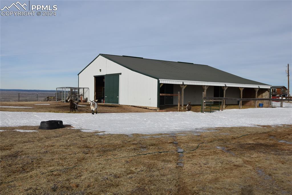 9990 Hahn Road Calhan, CO 80808 - Photo 15 of 25 a view of pool with outdoor seating