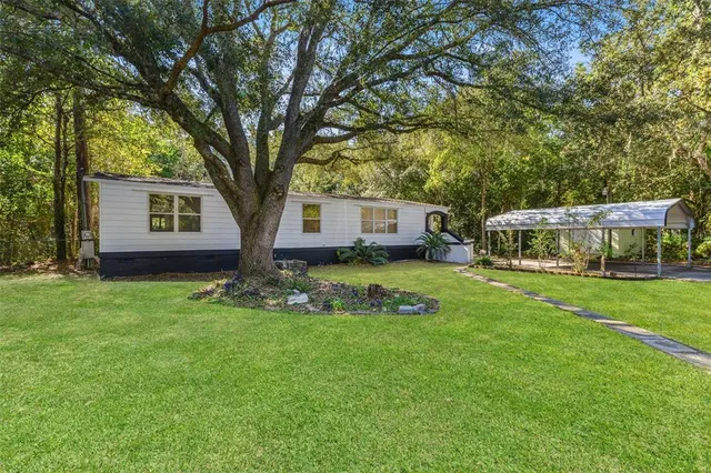 a front view of house with yard