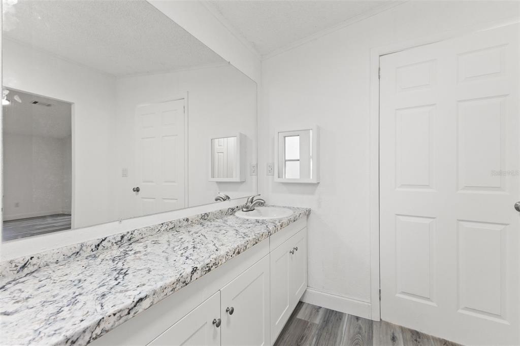 6718 West Pershing Drive Homosassa, FL 34448 - Photo 22 of 47 a bathroom with a sink and a mirror