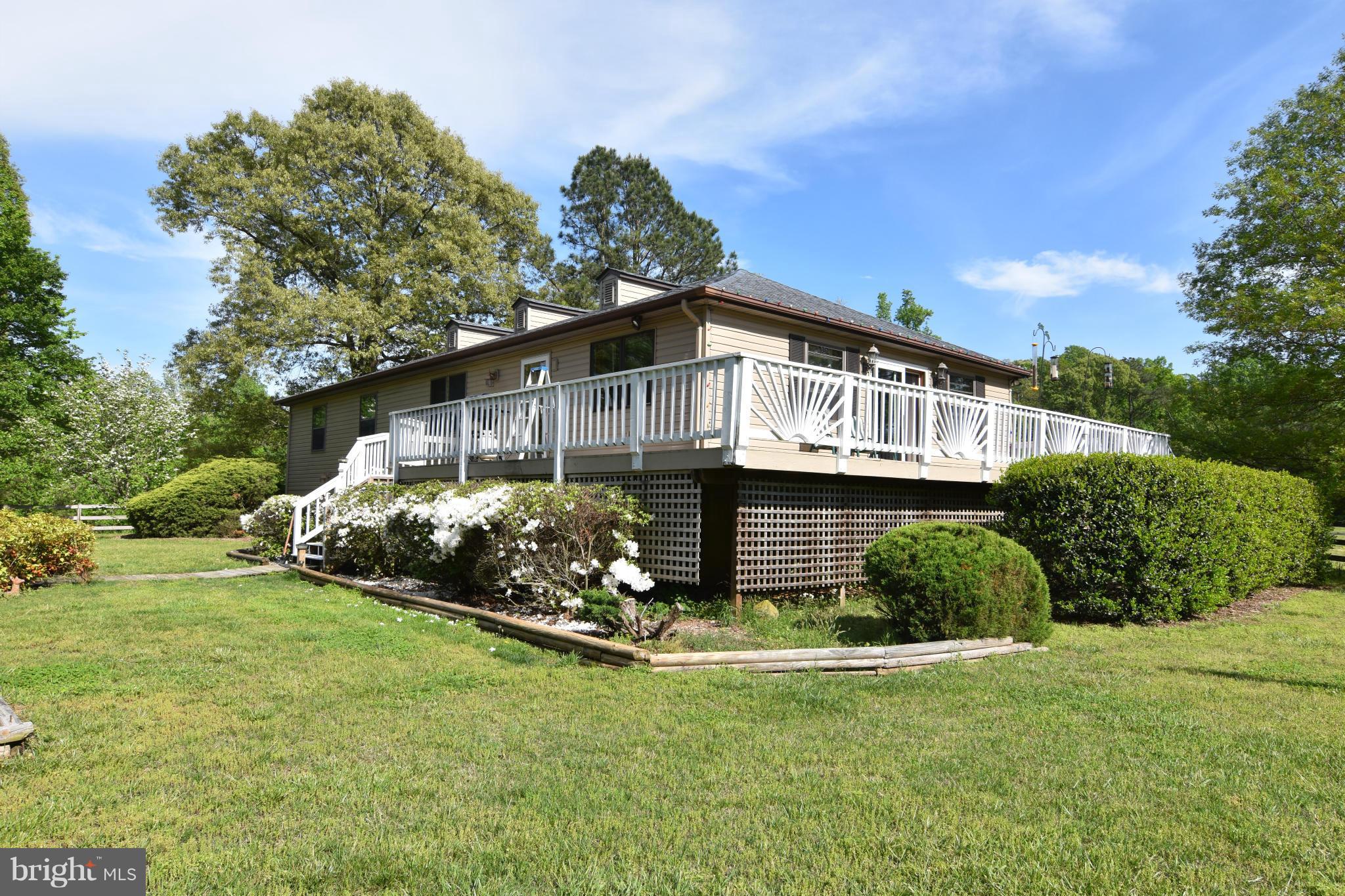 20510 Raceground Road Callaway, MD 20620 - Photo 1 of 30 a front view of a house with garden