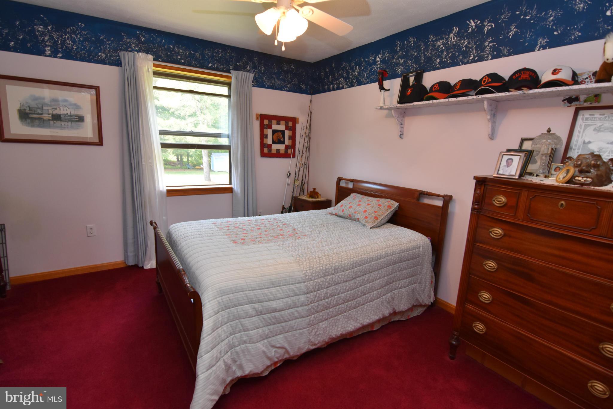 20510 Raceground Road Callaway, MD 20620 - Photo 13 of 30 a bedroom with a bed and a window