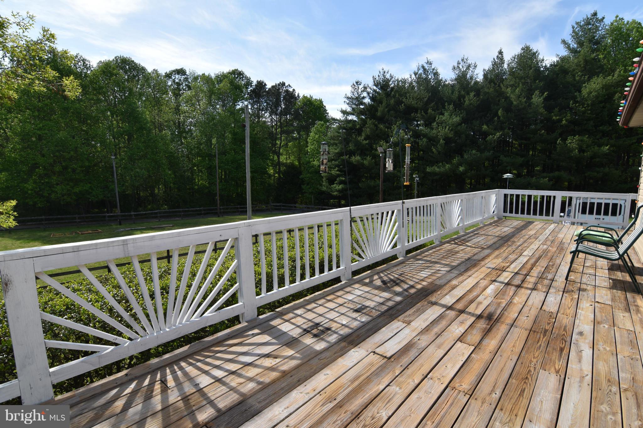 20510 Raceground Road Callaway, MD 20620 - Photo 17 of 30 a view of balcony with wooden floor and fence