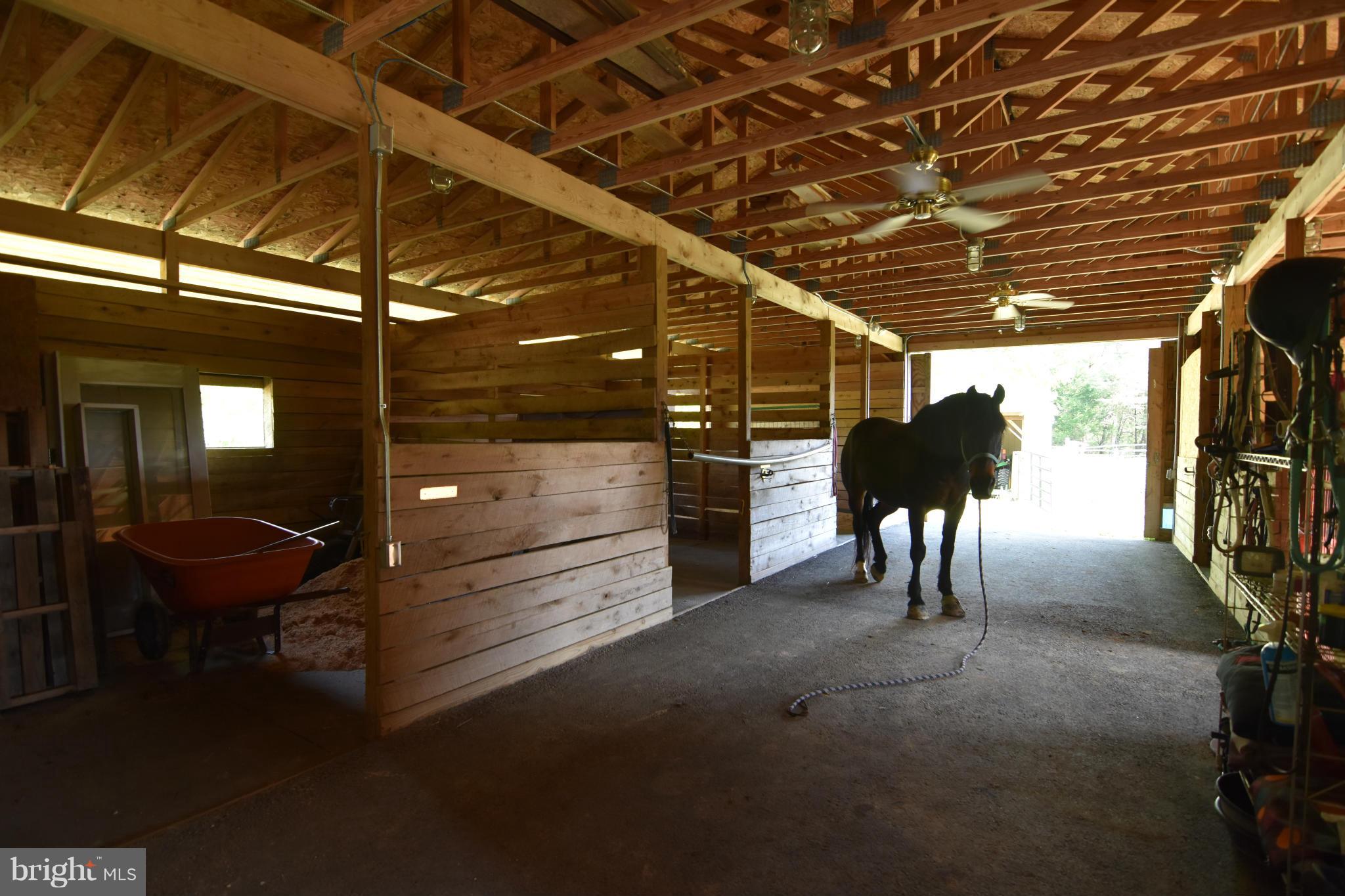 20510 Raceground Road Callaway, MD 20620 - Photo 29 of 30 a view of a porch with a table and chairs