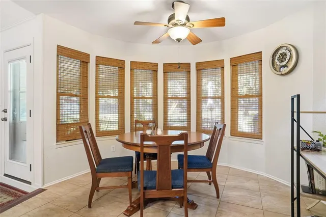 a spacious bathroom with a double vanity sink a mirror and a bathtub