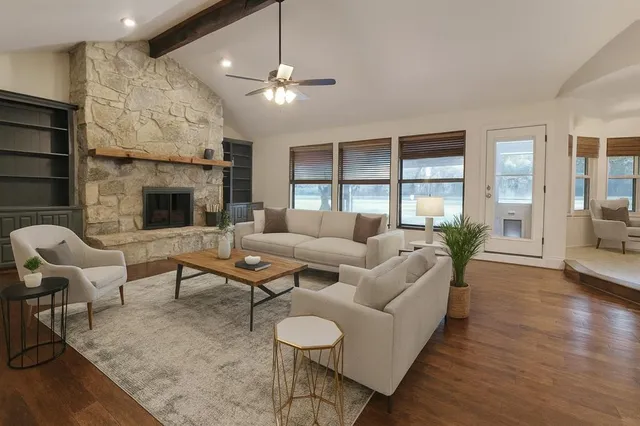a kitchen with stainless steel appliances granite countertop a stove and a sink