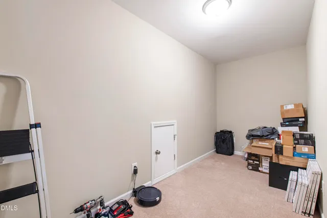 a view of workspace with furniture and wooden floor