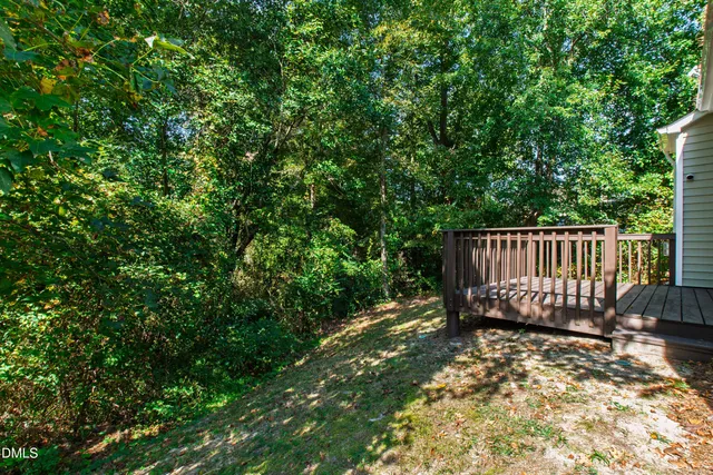 a view of balcony with wooden floor