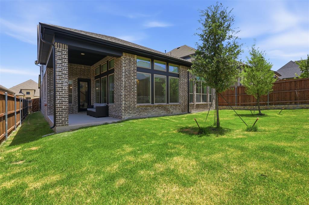 15413 Short Rdg Lane Fort Worth, TX 76008 - Photo 37 of 39 Expansive green lawn with established trees