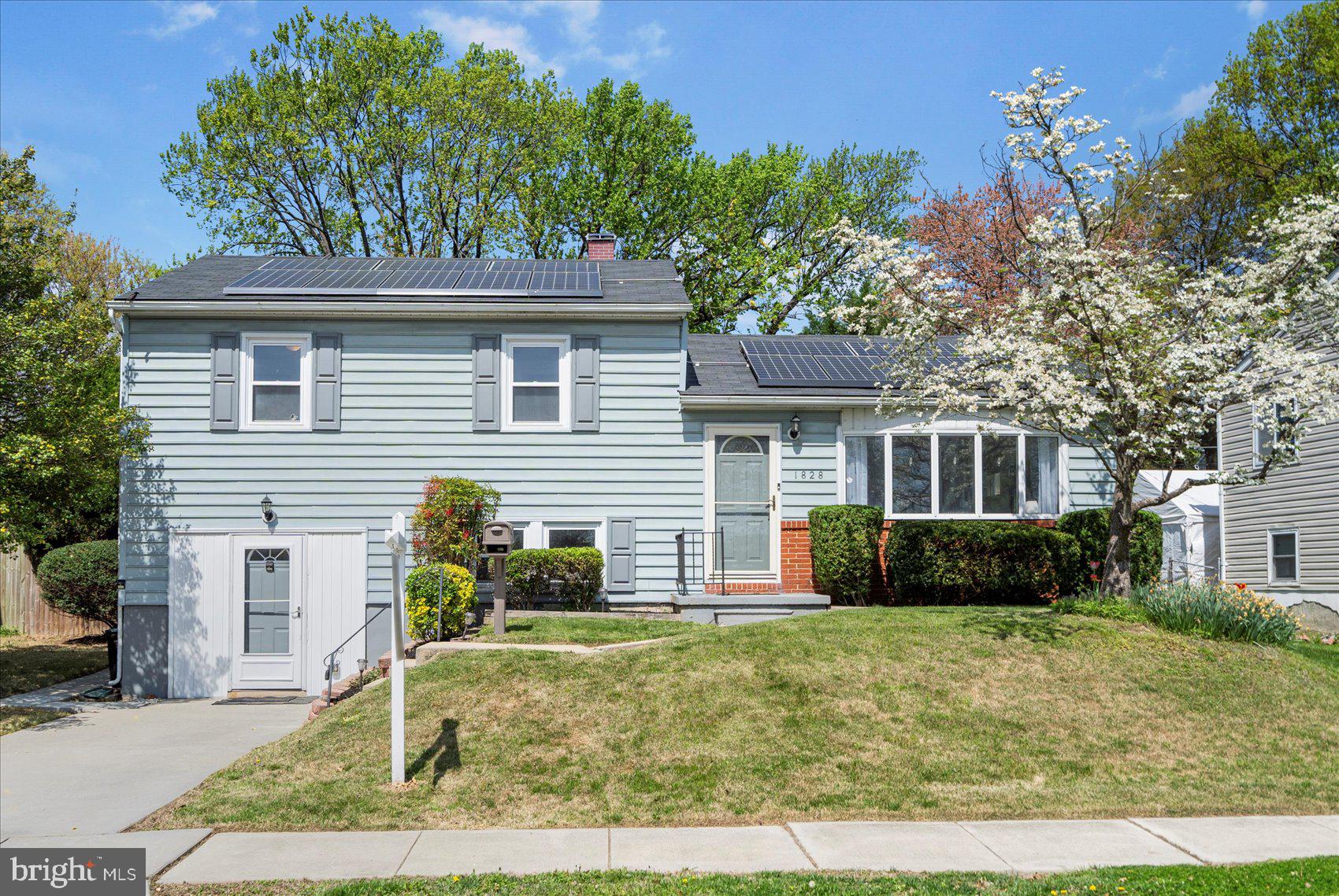 1828 Wycliffe Road Baltimore, MD 21234 - Photo 2 of 41 a front view of a house with a yard