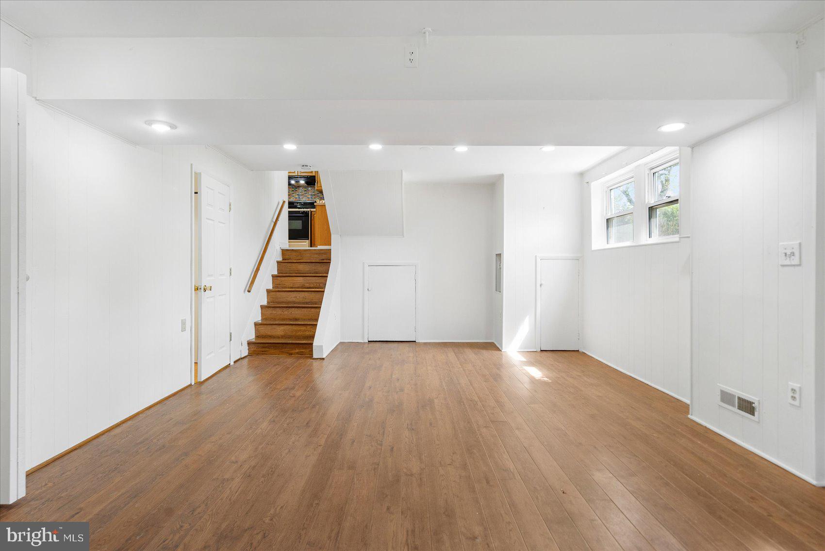 1828 Wycliffe Road Baltimore, MD 21234 - Photo 29 of 41 wooden floor in an empty room with wooden floor