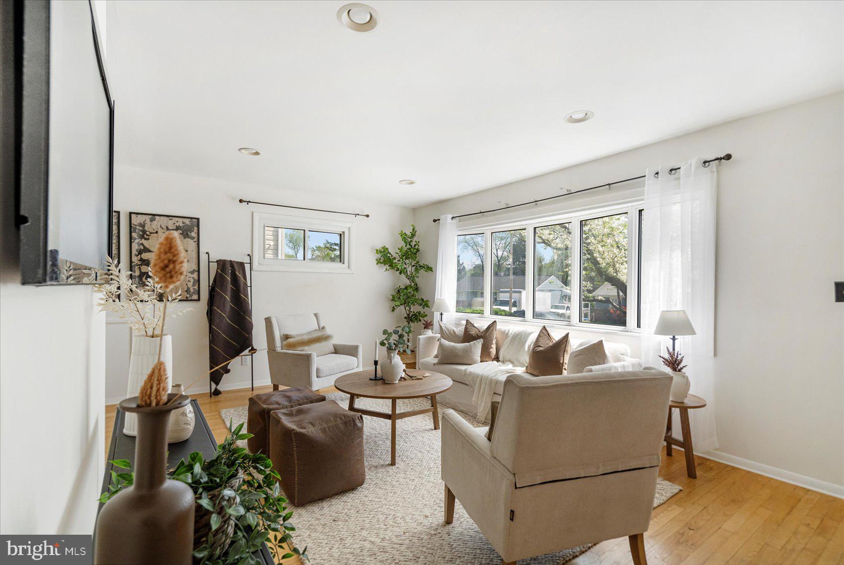 1828 Wycliffe Road Baltimore, MD 21234 - Photo 3 of 41 a living room with furniture and a large window