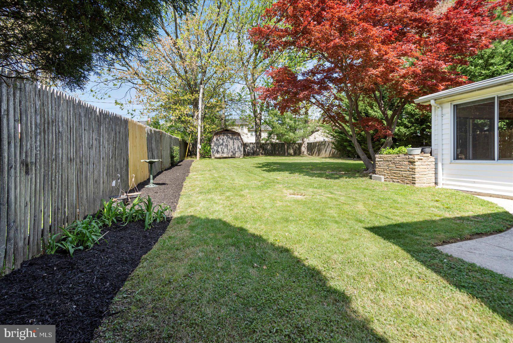 1828 Wycliffe Road Baltimore, MD 21234 - Photo 35 of 41 a view of a backyard with a garden