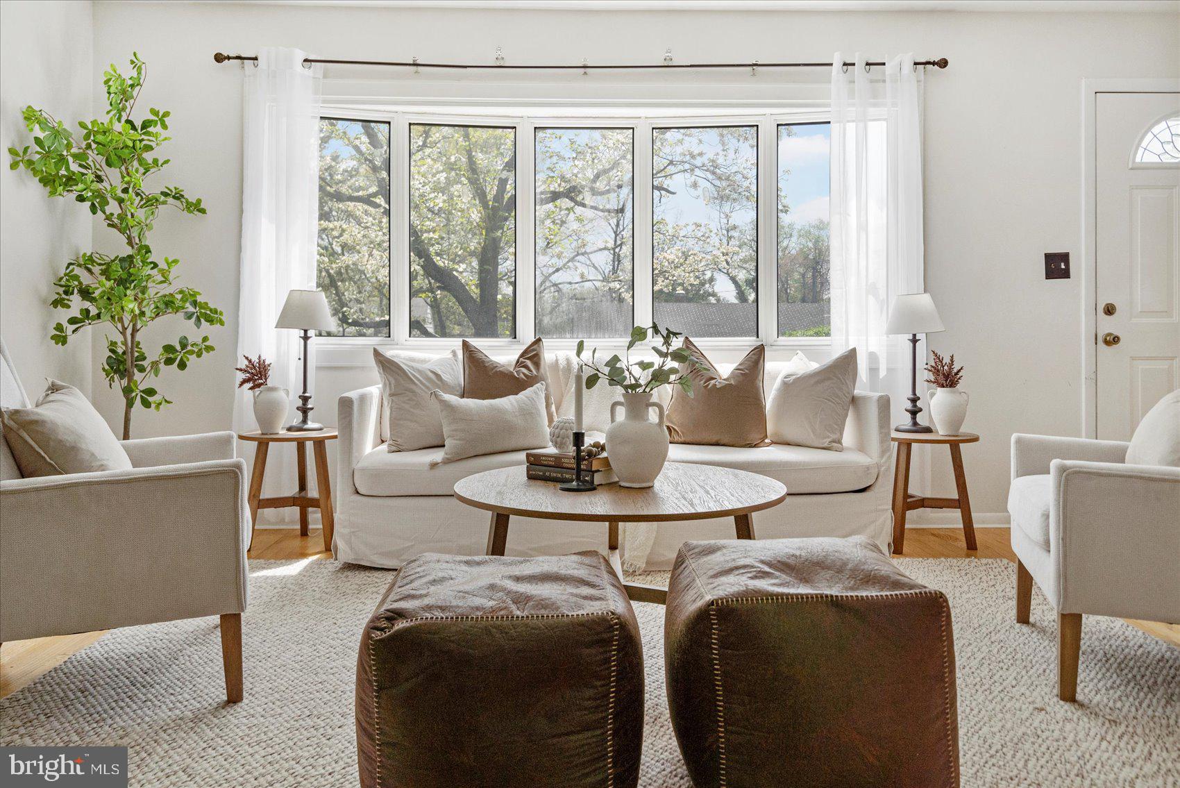 1828 Wycliffe Road Baltimore, MD 21234 - Photo 5 of 41 a living room with furniture and a large window