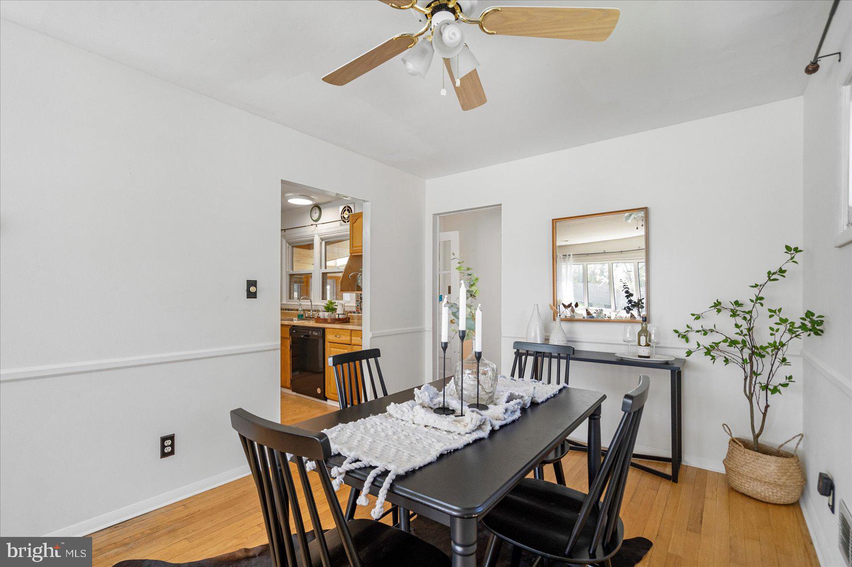 1828 Wycliffe Road Baltimore, MD 21234 - Photo 7 of 41 a view of a dining room with furniture and chandelier