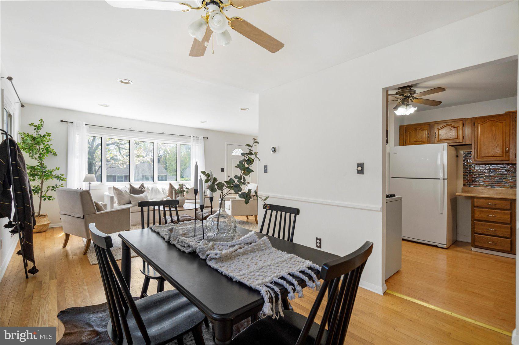 1828 Wycliffe Road Baltimore, MD 21234 - Photo 9 of 41 a view of a dining room with furniture window and wooden floor