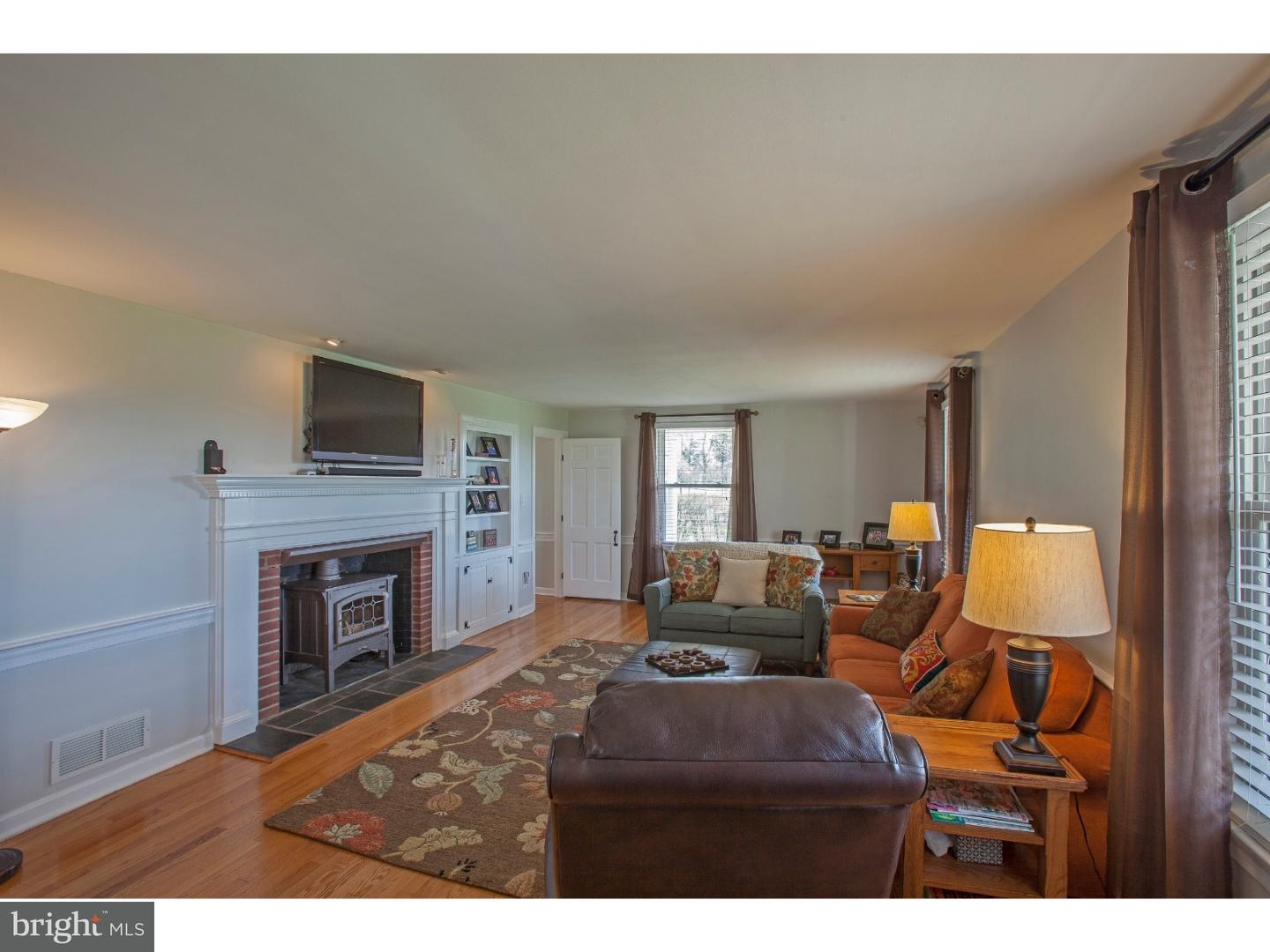 1606 Elephant Road Perkasie, PA 18944 - Photo 11 of 30 Living Room with Fireplace Insert