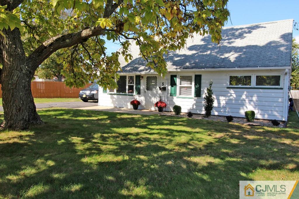 5 Ashley Road Edison, NJ 08817 - Photo 1 of 25 a front view of a house with garden