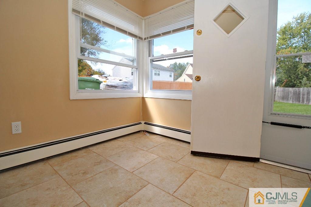 5 Ashley Road Edison, NJ 08817 - Photo 14 of 25 a view of an empty room and window