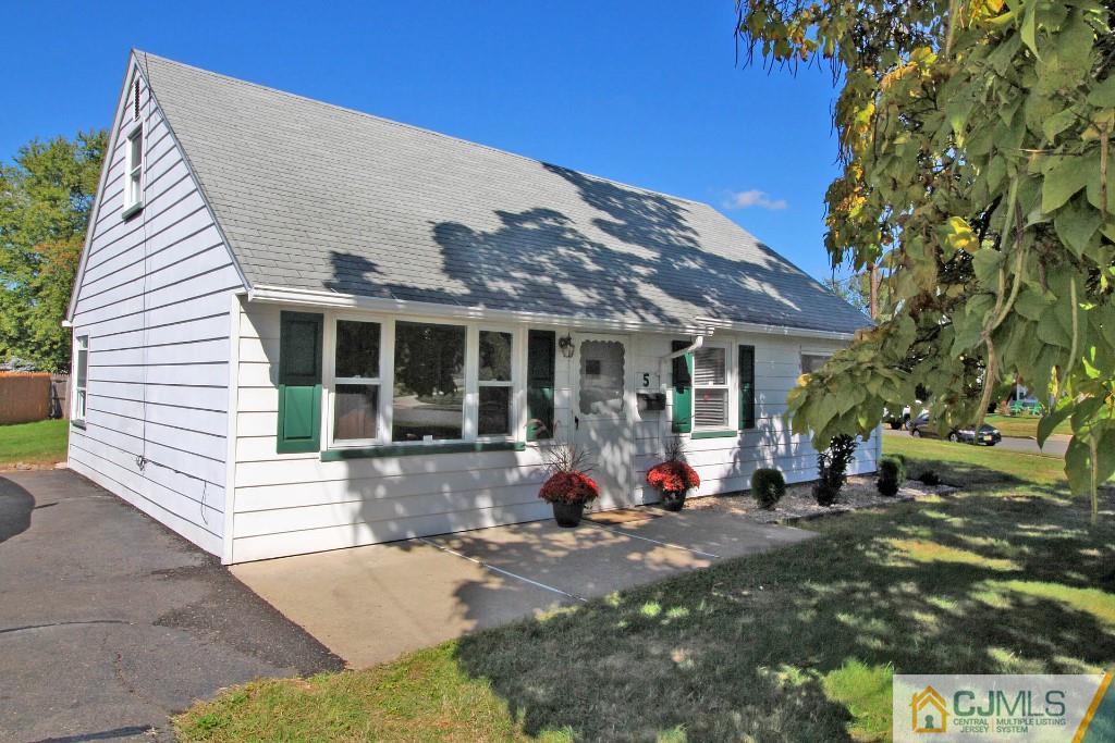 5 Ashley Road Edison, NJ 08817 - Photo 3 of 25 a view of a house with backyard sitting area and porch