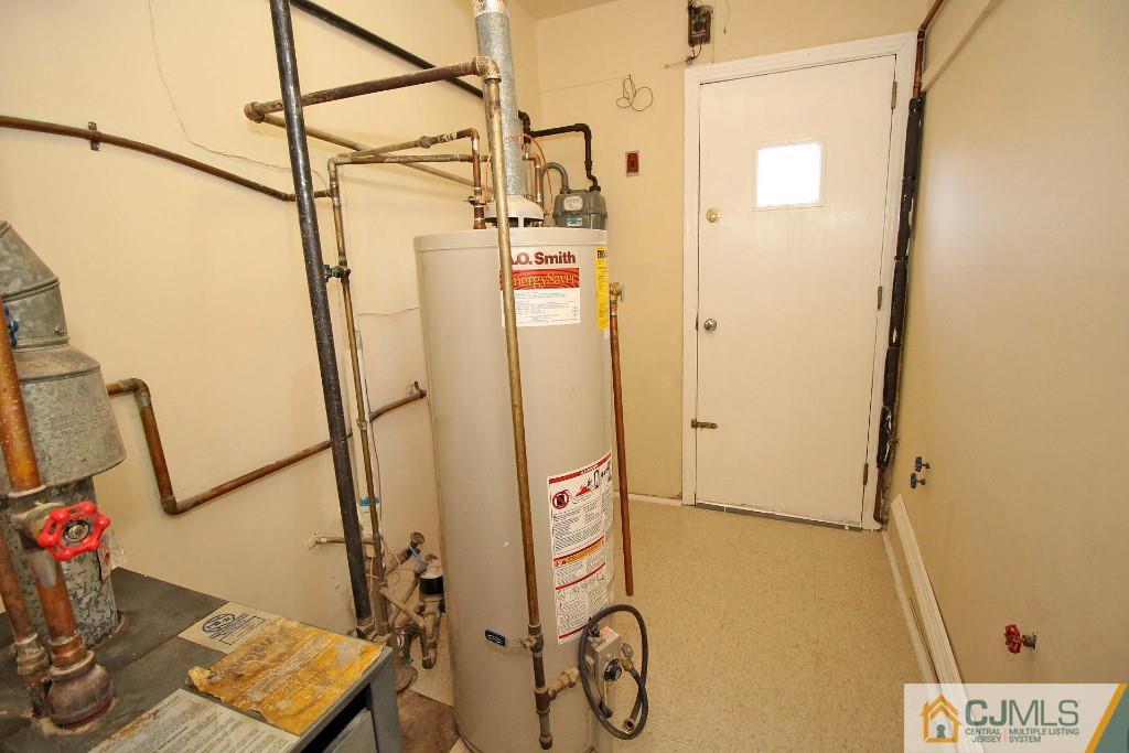 5 Ashley Road Edison, NJ 08817 - Photo 24 of 25 a view of a hallway with paintings on the wall