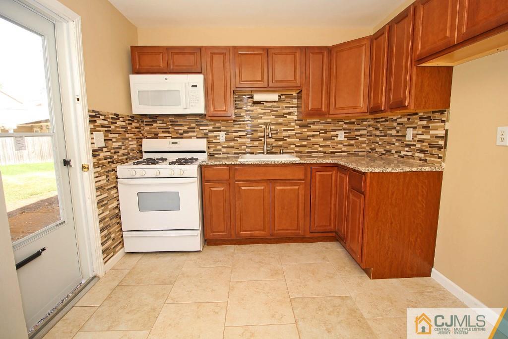5 Ashley Road Edison, NJ 08817 - Photo 9 of 25 a view of a kitchen with cabinets