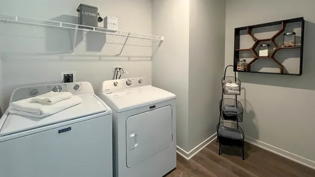 a utility room with dryer and washer