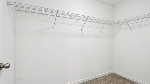 a view of a room with racks on the wall