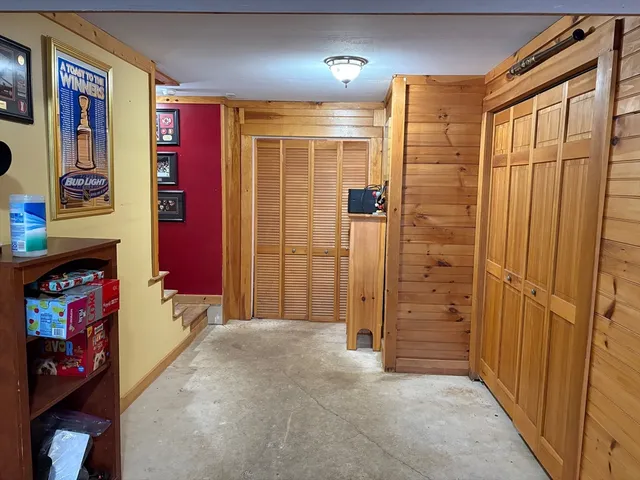 a view of a backyard with sitting area