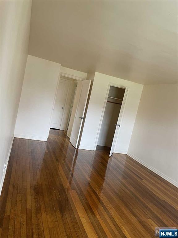 29 West Passaic Street Maywood, NJ 07607 - Photo 13 of 28 a view of entryway and hall with wooden floor