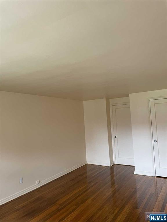29 West Passaic Street Maywood, NJ 07607 - Photo 19 of 28 a view of an empty room and wooden floor