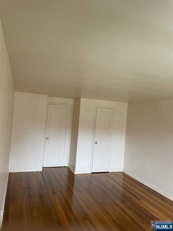 29 West Passaic Street Maywood, NJ 07607 - Photo 21 of 28 an empty room with wooden floor