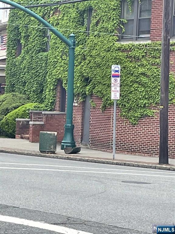 29 West Passaic Street Maywood, NJ 07607 - Photo 25 of 28 a sign that is on the side of a road