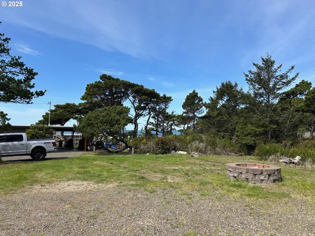 a view of a garden with an outdoor space